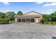 Detached three-car garage provides ample parking at 108 Woodlake Dr, Summerville, SC 29485