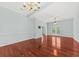 Bright living room featuring hardwood floors, ceiling fan, and generous natural light at 108 Woodlake Dr, Summerville, SC 29485