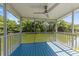 Screened porch with scenic water view and ceiling fan at 108 Woodlake Dr, Summerville, SC 29485