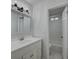 Bright and stylish bathroom showcasing a walk-in shower with tiled walls and a vanity at 109 Willow Ct, Summerville, SC 29486