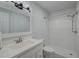 Bright bathroom featuring a walk-in shower, white subway tiles, and vanity with brushed nickel faucet at 109 Willow Ct, Summerville, SC 29486