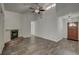 Bright living room featuring hardwood floors, fireplace, high ceilings, and lots of natural light at 109 Willow Ct, Summerville, SC 29486