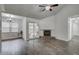 Spacious living room with tile floors, a fireplace and sliding glass doors to backyard patio at 109 Willow Ct, Summerville, SC 29486