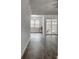 Spacious, naturally lit living room with tile floors and sliding glass doors at 109 Willow Ct, Summerville, SC 29486