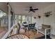 Screened patio with ceiling fan and furniture creating an inviting outdoor living space at 109 Willow Ct, Summerville, SC 29486