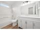 Modern bathroom featuring white cabinets, vanity, toilet, and a bathtub with shower at 113 Alcester Rd, Goose Creek, SC 29445