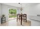 Cozy dining area with an outdoor view, modern pendant lighting and a table with seating for four at 113 Alcester Rd, Goose Creek, SC 29445
