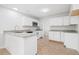 Open kitchen with white cabinets, stainless steel appliances, granite countertops, and center island at 113 Alcester Rd, Goose Creek, SC 29445