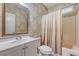 Bathroom with traditional wallpaper, vanity, and shower-tub combo at 1148 Black Rush Cir, Mount Pleasant, SC 29466
