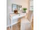 Desk space with stylish chair, natural light, and modern decor at 1148 Black Rush Cir, Mount Pleasant, SC 29466