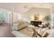 Bright and airy living room with vaulted ceilings, hardwood floors, and plenty of natural light at 1148 Black Rush Cir, Mount Pleasant, SC 29466