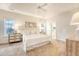 Bright main bedroom featuring tray ceilings, neutral tones, and a serene atmosphere at 1148 Black Rush Cir, Mount Pleasant, SC 29466