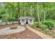 Charming outbuilding with a well-manicured lawn and lush landscaping at 1148 Black Rush Cir, Mount Pleasant, SC 29466