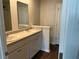 Bright bathroom with a double vanity, white cabinetry, and ample counter space at 116 Gaura Ln, Summerville, SC 29483