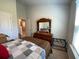 Bedroom featuring a queen bed, dresser, and a bright window, offering a comfortable and well-lit space at 116 Gaura Ln, Summerville, SC 29483