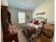 Bedroom with a queen bed, dresser, and neutral decor, providing a cozy and relaxing living space at 116 Gaura Ln, Summerville, SC 29483
