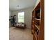 Bedroom featuring carpeted floor, window view, bookshelf and cat tree at 116 Gaura Ln, Summerville, SC 29483