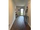 Inviting entryway with wood floors, console table, and decorative mirror creating a welcoming atmosphere at 116 Gaura Ln, Summerville, SC 29483