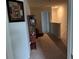 Upstairs hallway featuring neutral carpet and paint and an open concept design at 116 Gaura Ln, Summerville, SC 29483