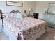 Cozy bedroom featuring floral bedding, complemented by neutral walls and inviting decor at 123 Lynches River Dr, Summerville, SC 29485