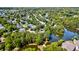 Aerial view of a residential community featuring well-maintained homes, ponds, and lush landscaping at 1231 Wild Olive Dr, Mount Pleasant, SC 29464