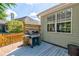 Back deck with a new grill, overlooking a fenced-in yard at 1231 Wild Olive Dr, Mount Pleasant, SC 29464