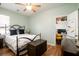 Bedroom with a ceiling fan, desk, and view to small workspace room at 1231 Wild Olive Dr, Mount Pleasant, SC 29464