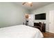 Bedroom with a ceiling fan, TV, and view to small workspace room at 1231 Wild Olive Dr, Mount Pleasant, SC 29464