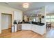 Open kitchen featuring stainless steel appliances, granite counters, and seamless connection to the dining area at 1231 Wild Olive Dr, Mount Pleasant, SC 29464