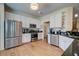 Modern kitchen equipped with stainless steel appliances, granite countertops, and white cabinetry at 1231 Wild Olive Dr, Mount Pleasant, SC 29464