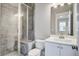 Modern bathroom featuring a glass-enclosed shower and vanity with marble countertops at 1363 Rivella Dr, Mount Pleasant, SC 29464