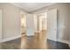 A view into an office showcasing a modern desk and open doorway to a stylishly decorated home at 1363 Rivella Dr, Mount Pleasant, SC 29464