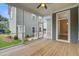 Cozy screened porch with wood flooring and access to the home's exterior at 1363 Rivella Dr, Mount Pleasant, SC 29464
