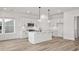 Modern kitchen featuring an island, stainless steel appliances, and white cabinets at 137 Summerwind Dr, Summerville, SC 29486