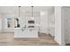 Modern kitchen featuring an island, stainless steel appliances, and white cabinets at 137 Summerwind Dr, Summerville, SC 29486