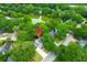 Stunning aerial view of home showcasing manicured lawn and mature trees surrounding the property at 1394 Center Lake Dr, Mount Pleasant, SC 29464
