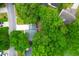 Aerial view of home with expansive driveway and surrounded by mature trees at 1394 Center Lake Dr, Mount Pleasant, SC 29464