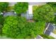 Home aerial view showcasing mature trees surrounding the property on a large lot at 1394 Center Lake Dr, Mount Pleasant, SC 29464