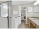 Open concept bathroom with a glass shower, vanity, and view into the bedroom, enhancing the suite feel at 1394 Center Lake Dr, Mount Pleasant, SC 29464
