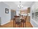 Dining area adjacent to the kitchen featuring a wood table set and stainless steel appliances at 1394 Center Lake Dr, Mount Pleasant, SC 29464