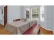 Cozy dining area with bay windows, wood floors, and seating bench at 1394 Center Lake Dr, Mount Pleasant, SC 29464