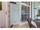 Charming exterior window with baby blue shutters and cozy porch area at 1394 Center Lake Dr, Mount Pleasant, SC 29464