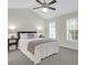 Comfortable main bedroom with a ceiling fan, plush carpet, and bright windows at 1394 Center Lake Dr, Mount Pleasant, SC 29464