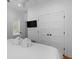 Bright, minimalist bedroom with white walls, hard wood floors, and plenty of closet space at 142 President St, Charleston, SC 29403