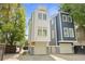 Modern, multi-story homes with private garages; Charleston architecture at 142 President St, Charleston, SC 29403