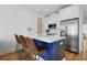 Modern kitchen with a quartz countertop island, stainless steel appliances at 142 President St, Charleston, SC 29403