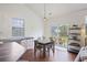 Dining area with a wooden table and chairs with sliding door access to the backyard at 1470 Ashley Gardens Blvd, Charleston, SC 29414