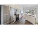 Bright kitchen with stainless steel appliances, white cabinets, and granite countertops at 1470 Ashley Gardens Blvd, Charleston, SC 29414