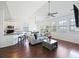 Bright living space featuring hardwood floors, modern kitchen, and a dining area at 1470 Ashley Gardens Blvd, Charleston, SC 29414