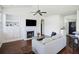 Spacious living area with a fireplace, built-in cabinets, and open access to entryway at 1470 Ashley Gardens Blvd, Charleston, SC 29414